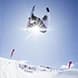 A snowboarder gets big air in the half pipe at Cardrona.