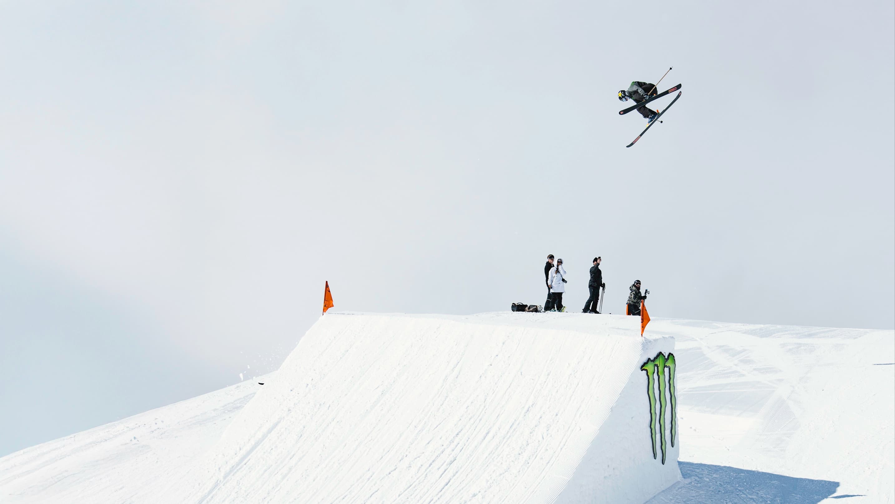 Athlete soaring above a Monster-branded jump during the NZ Freestyle Nationals.